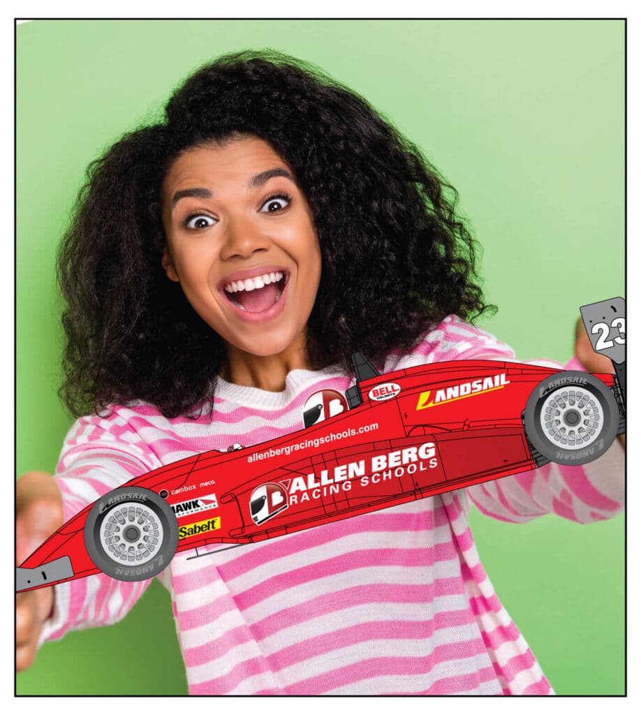 Smiling mom holding allen berg's racing car